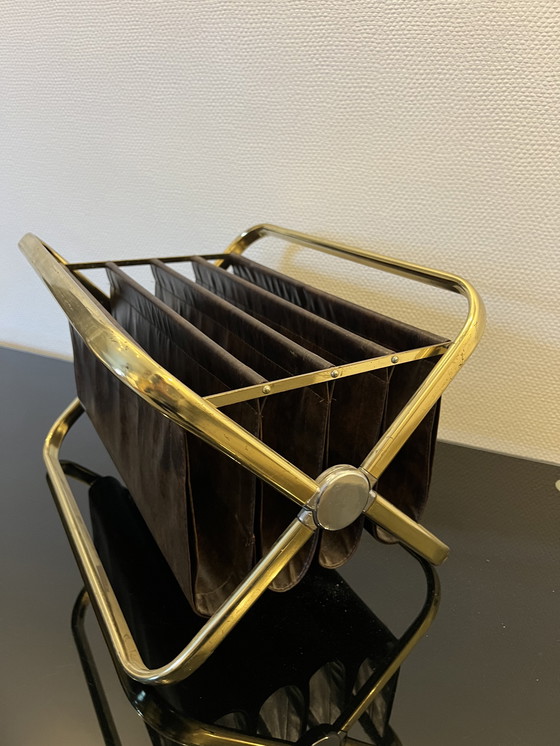 Image 1 of Castelli krantenhouder jaren 60