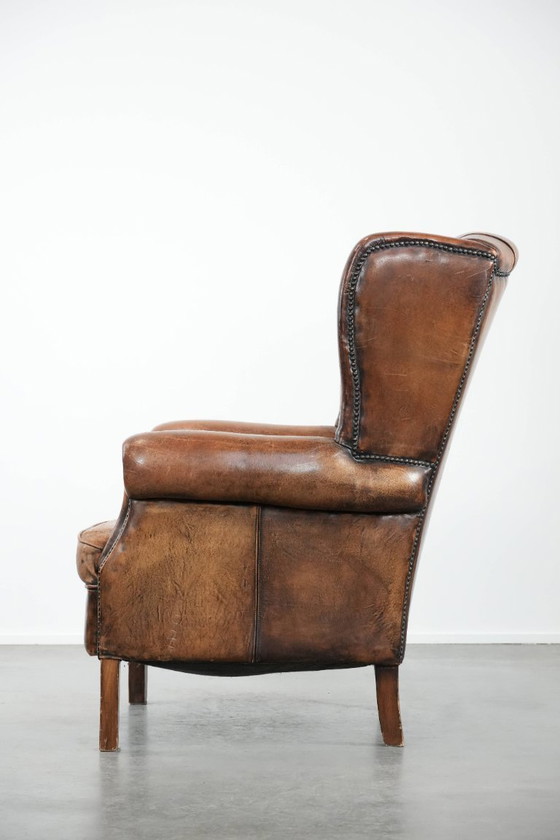 Image 1 of Unique large English-style sheepskin Chesterfield wing armchair