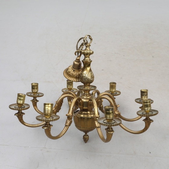 Image 1 of Antique brass chandelier dating from 1920–1930, with eight fittings, dimensions 21 cm wide, 55 cm high and 75 cm deep, in good 