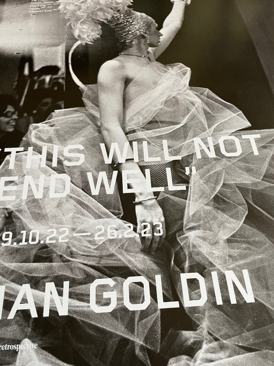 Image 1 of Nan Goldin, exibition poster  “This Will Not End Well” Naomi presenting a stage show, Boston (1973) fran The Other Side, 1992-20