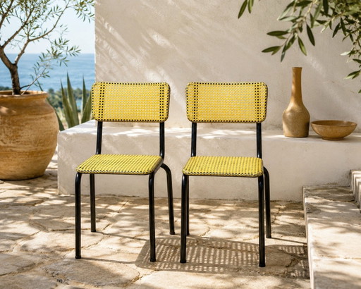 Een paar Art Prog-stoelen – Geel geweven plastic en zwart staal – Frankrijk, jaren 1950