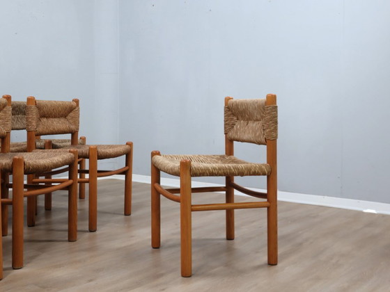Image 1 of Juego de 8 sillas estilo Charlotte Perriand de los años 60, de paja tejida y madera.