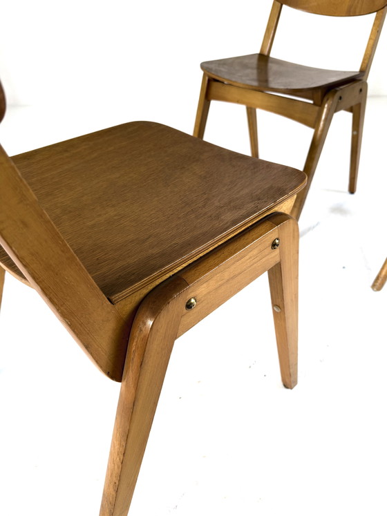 Image 1 of Lotto di 19 sedie impilabili vintage in compensato degli anni '60