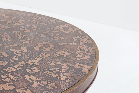 Image 1 of Vintage brutalist round coffee table in copper and wood from the 1970s