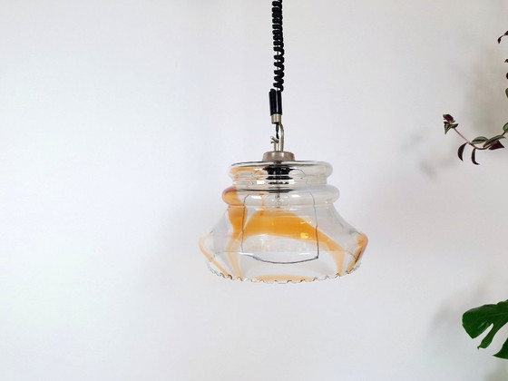 Image 1 of Vintage 1970s Yugoslavian Pendant Light / Mid-Century Glass Ceiling Lamp / Retro Amber Swirl Hanging Light