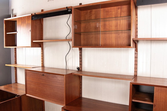 Image 1 of Zeer grote modulaire Deense teakhouten wandkast van Poul Cadovius voor Cado 1960.