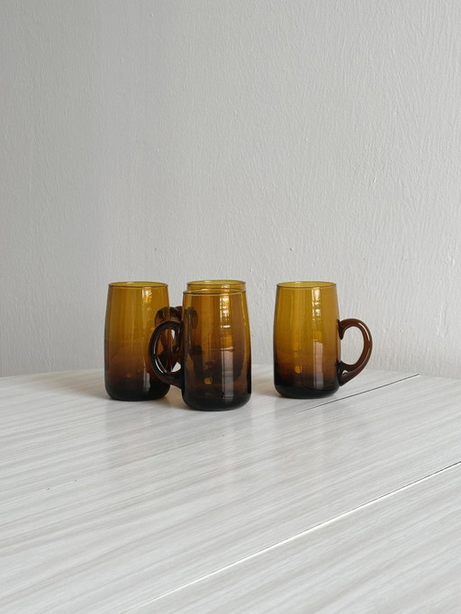 4 hand-blown amber glass mugs