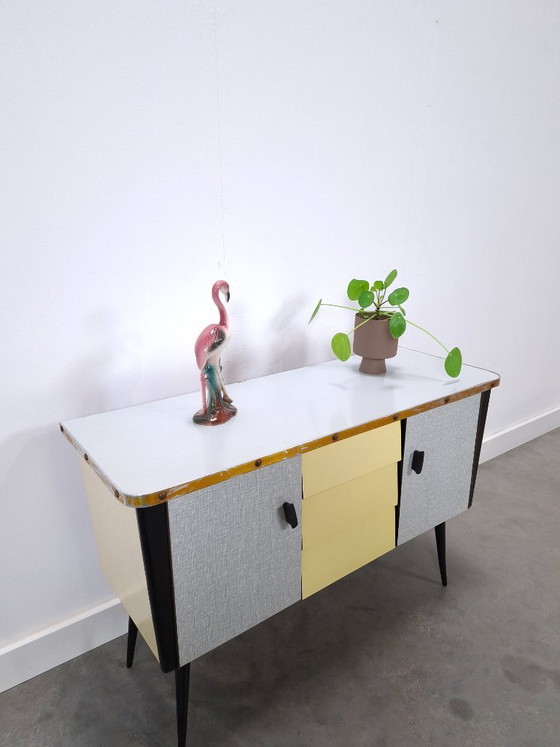 Image 1 of 1950s light blue-yellow cabinet with Formica and slanted legs