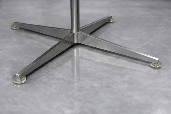 Image 1 of Fauteuil pivotant et repose-pieds en cuir marron, style danois moderne vintage, années 1970, ensemble de 2