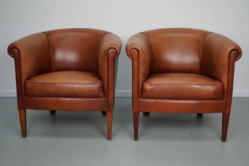 Sillones de club holandeses vintage en cuero color coñac, juego de 2