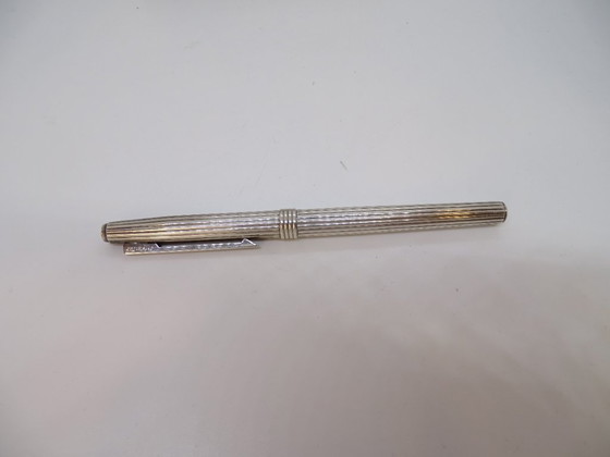 Image 1 of Penna a sfera scanalata Dior, metallo argentato, anni '70 - Francia