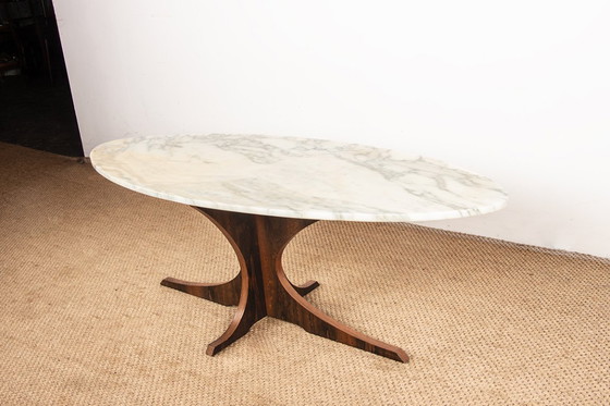 Image 1 of Oval coffee table in Carrara marble and rosewood by Hugues Poignant 1960.