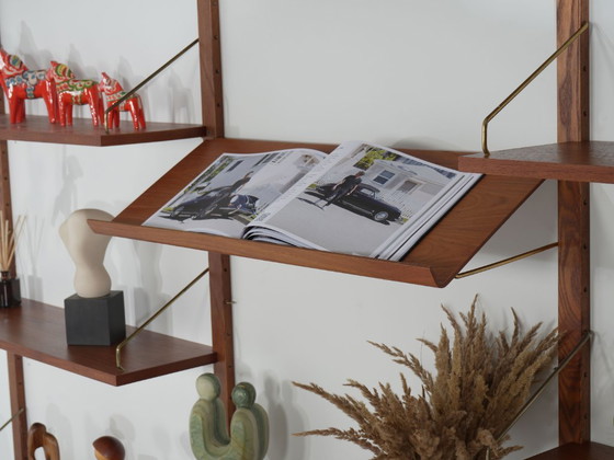 Scaffali a muro modulari Cado, Poul Cadovius, Impiallacciatura in teak, Danese, Anni '70 – Legno (photo 9 of 21)