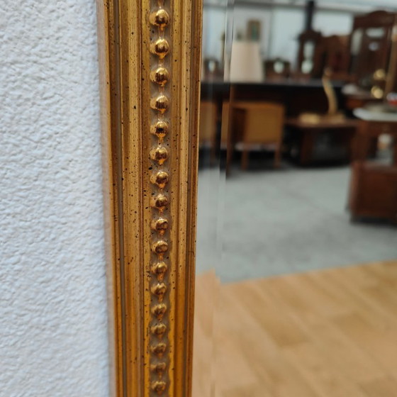 Image 1 of Miroir sur pied DeKnudt vintage doré de style Hollywood Regency