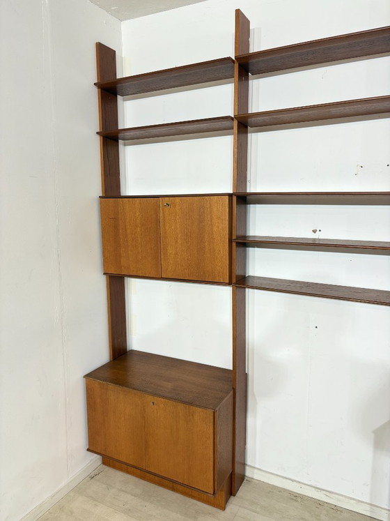 Modular mid-century wall shelf by interna-Peter Pedrides / Teak shelving system 1960s – Shelving unit, Wood (photo 3 of 27)