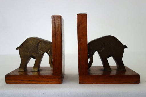 Pair of vintage wood and brass elephant bookends