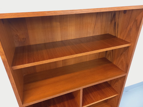 Image 1 of Scandinavian modernist style modular bookcase in teak and black metal from the 60s