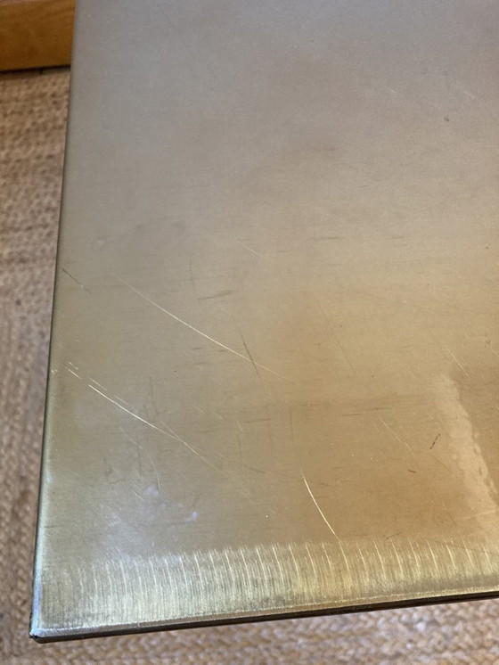 Image 1 of Electro-galvanized metal seat, brass effect. Pharrell Williams / Louis Vuitton fashion show, 2024