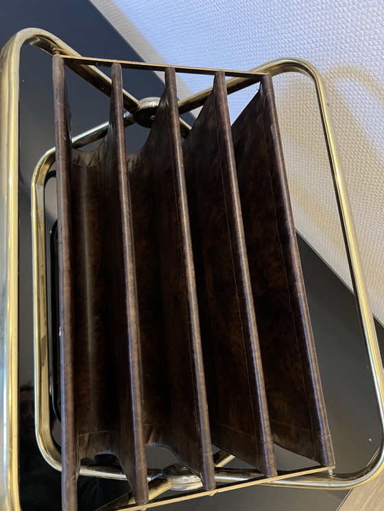 Image 1 of Castelli krantenhouder jaren 60