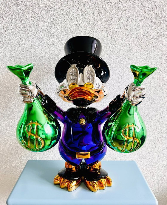 Image 1 of Dagobert Pato obra de arte dinero escultura única LV Información: * Nuevo * Altura: 40 cm. * Anchura: 32 cm.