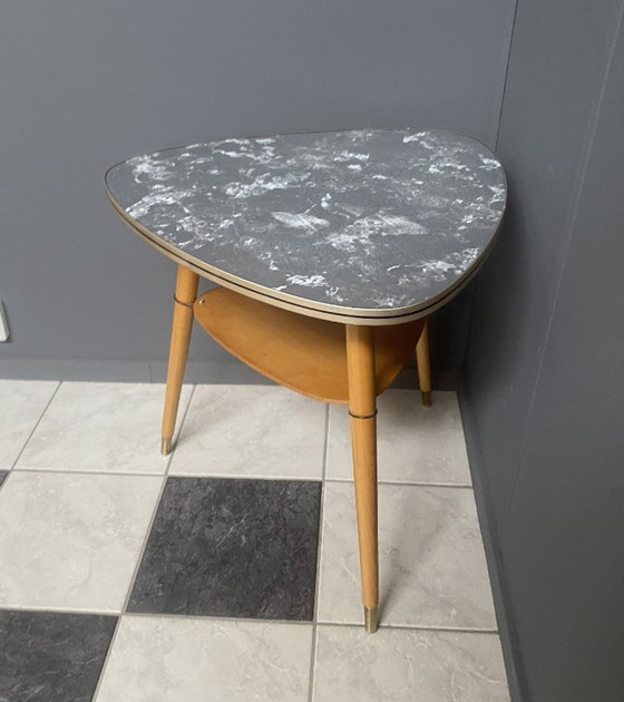 Image 1 of plectrum shaped 1960s formica coffee table