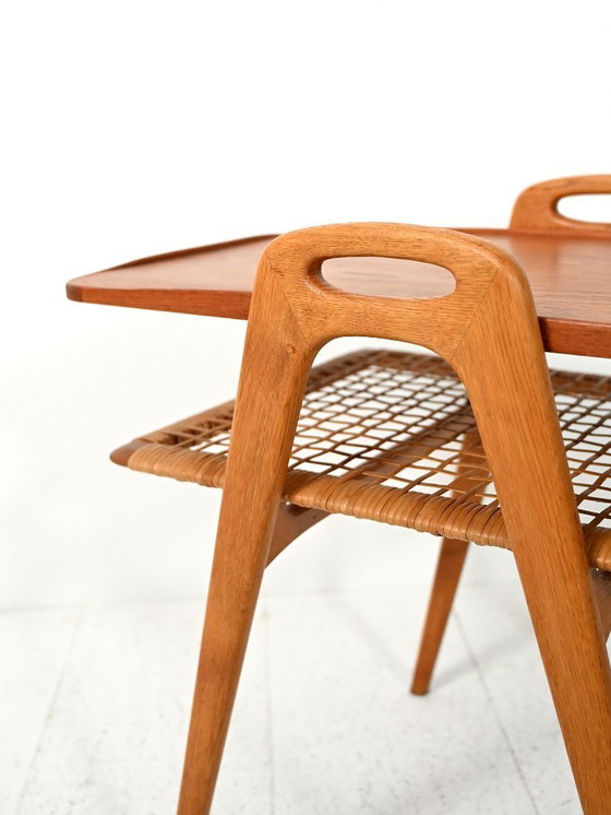 Image 1 of Deense salontafel uit de jaren 60 van teak en eikenhout.