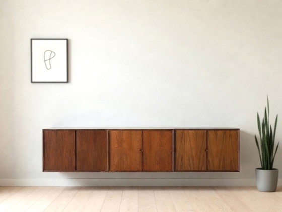 Image 1 of Poul Cadovius zwevend wanddressoir van palissanderhout, van CADO, jaren 1960.