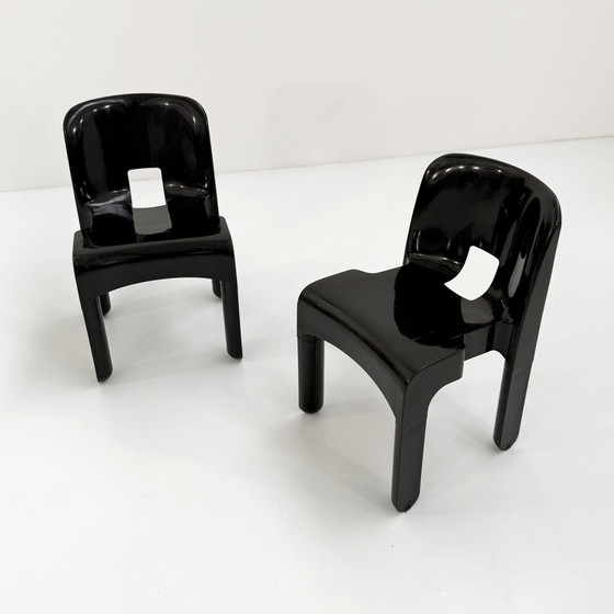 Image 1 of Set di 4 sedie Universale modello 4867 nere di Joe Colombo per Kartell, anni &#39;70