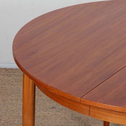 Round, extendable wooden dining table, 1960