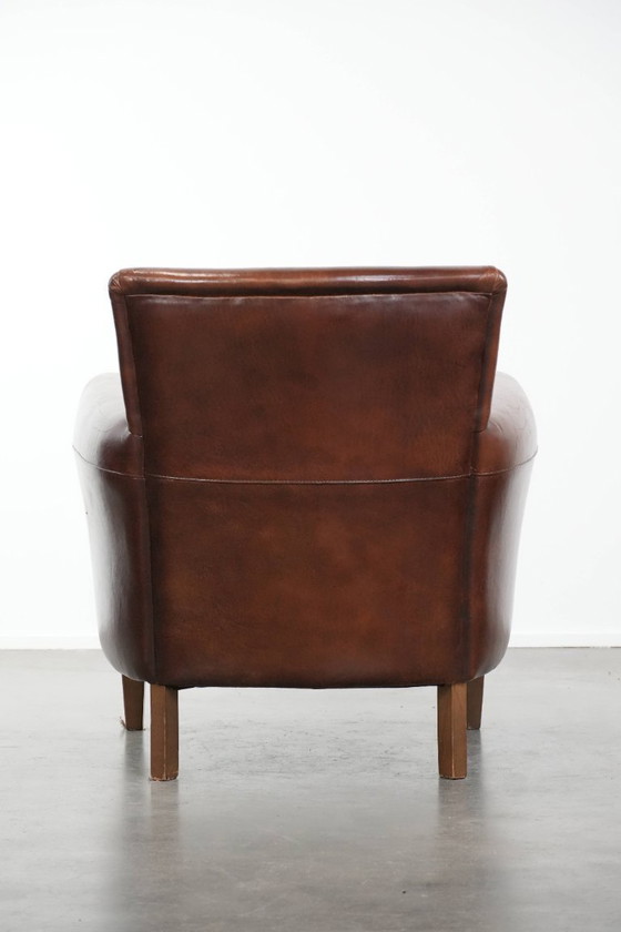 Image 1 of Vintage schapenleren fauteuil/ armchair met prachtige warme kleuren