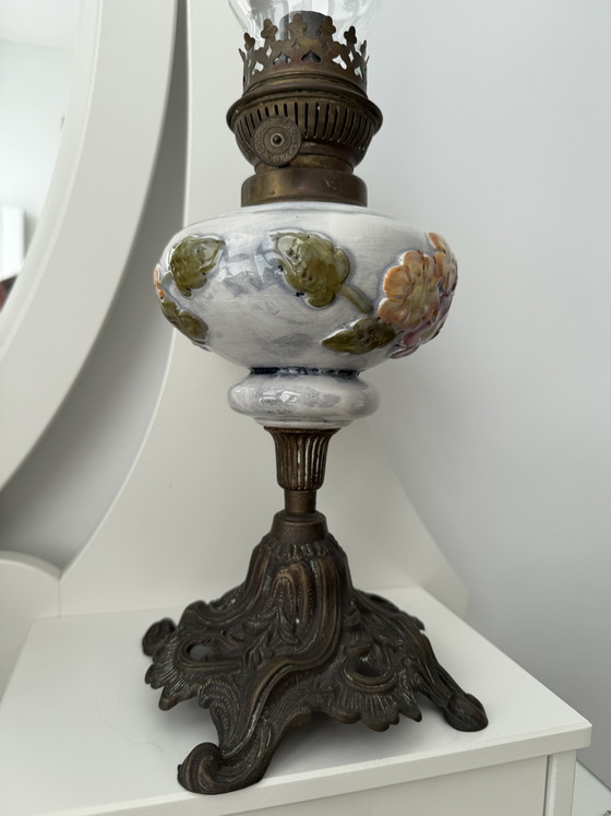 Image 1 of Antique kerosene lamp with ceramic floral decoration and P&A burner – ca. 1900