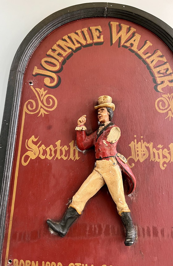 Image 1 of JOHNNIE WALKER – Original vintage wooden plaque with 3D relief figure “The Striding Man” (ca. 1970s)