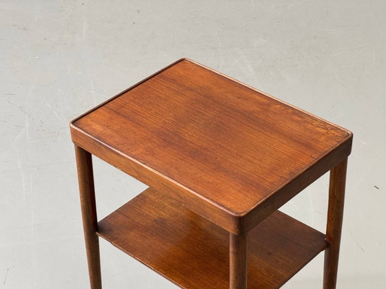 Image 1 of Mid-Century Beistelltisch mit Ablage aus Teakholz, 1960er Jahre