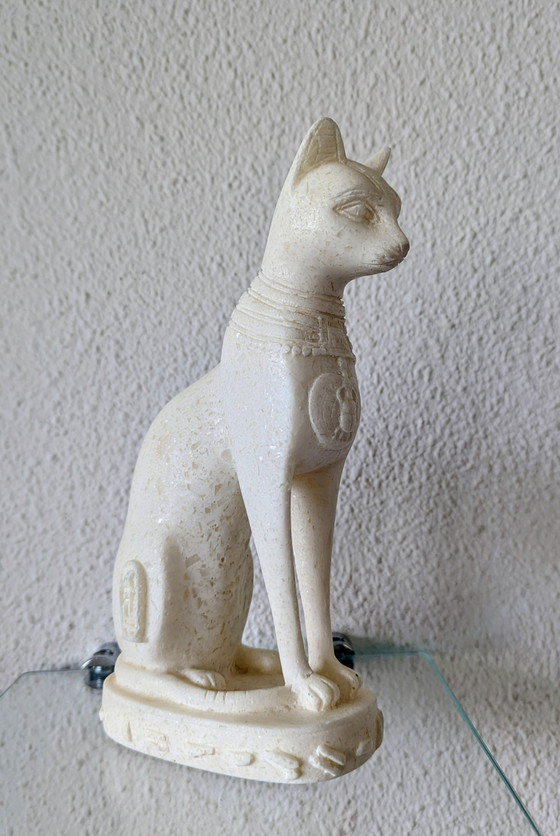 Image 1 of Egyptian Goddess Statue Basted in White Marble or Stone