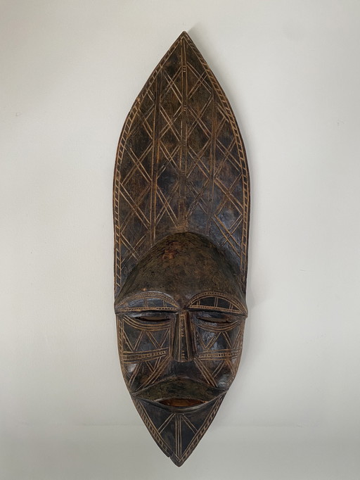 Hand-carved wooden ritual mask