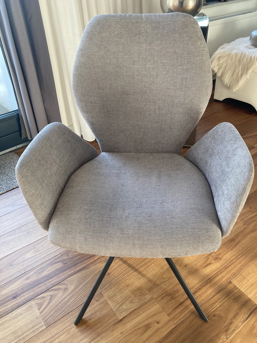 4 X OS stoelen model Hera, spinpoot 360gr.draaibaar retumfunctie stof fijn geweven licht grijs.onderstel zwart.