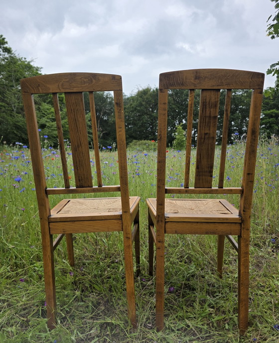 Image 1 of Art Deco eiken stoelen met rieten zitting set van 2