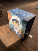 Vintage cabinet upcycled with art prints by Sailor