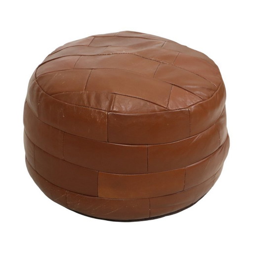 Pouf rotondo vintage in similpelle con patchwork