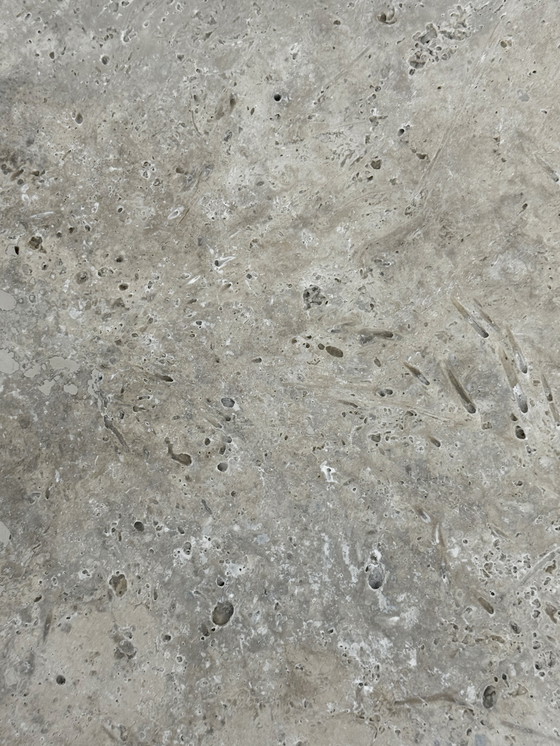 Image 1 of 🗿 Elegancia escultórica: Mesa “Angelo M” en Travertino Plata de Leo Aerts para Linea Design Objects