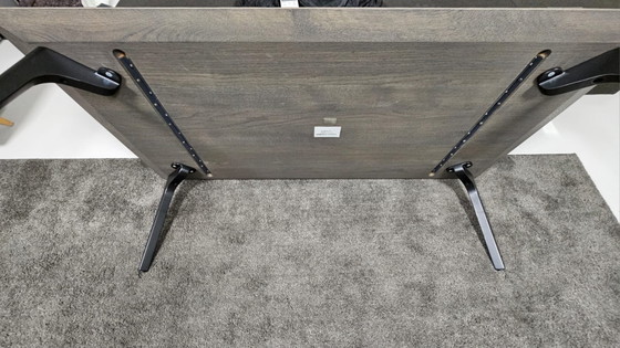 Image 1 of Leolux rolan salontafel 130x70. Blad: eiken; poten: epoxy; tafel hoogte 37cm