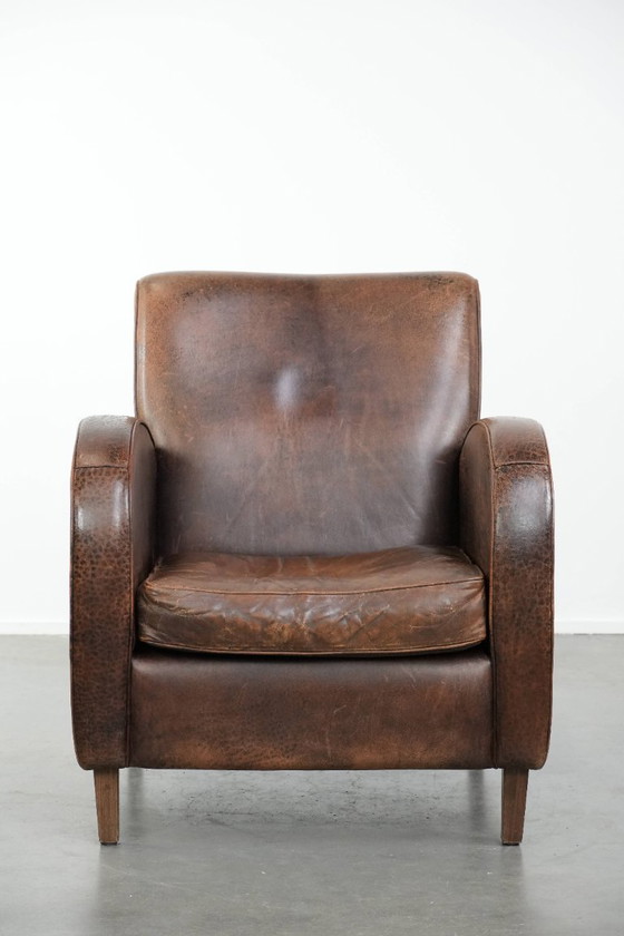 Image 1 of Vintage schapenleren armchair met een ronde vormgeving 