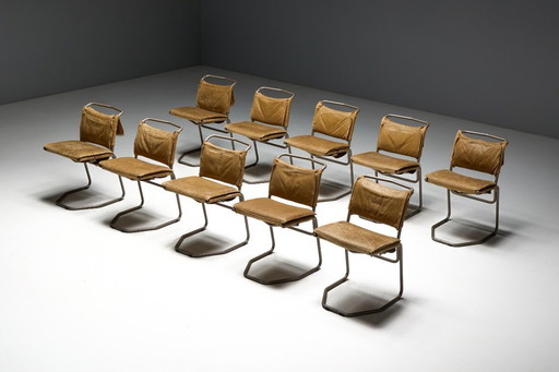 Eetkamerstoel van leer en staal, ontworpen door Raymond Rombouts, België, 20e eeuw.