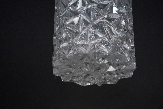 Image 1 of Een paar Italiaanse hanglampen van glas en gepolijst aluminium, jaren 70.