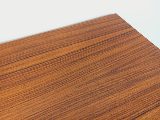 Image 1 of Vintage Scandinavian modernist style chest of drawers in rosewood and black metal from the 1960s