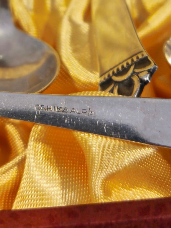 Image 1 of Posate antiche, candeliere e contenitore in argento del 1919.