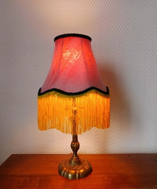 Art Nouveau bronze lamp with fringed lampshade