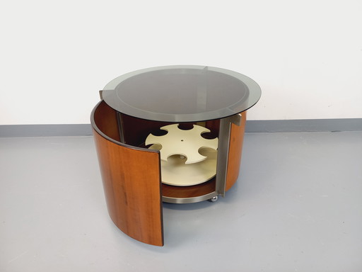 Round vintage Italian coffee table with swivel bar on castors by Eugenio Gerli for Tecno, in bent teak.