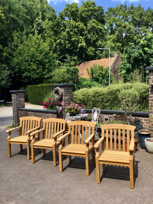 4 magnifiques chaises en teck de la marque Gloster