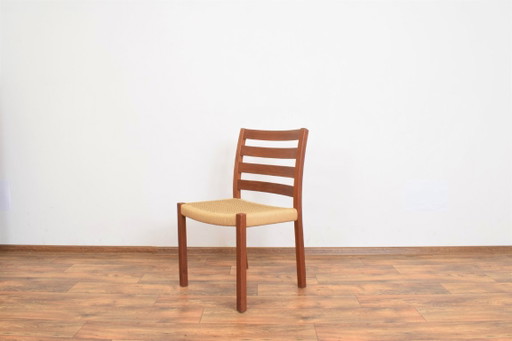 Silla de comedor danesa de teca de mediados de siglo, diseñada por Niels O. Møller para J.L. Møllers en la década de 1960.
